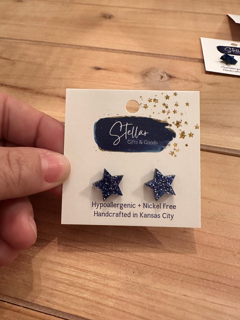 Blue glitter star earrings